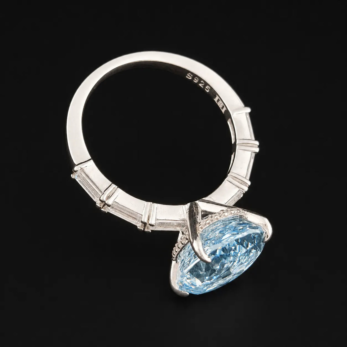 Full view of S925 stamped sterling silver ring with baguette cut shoulder stones