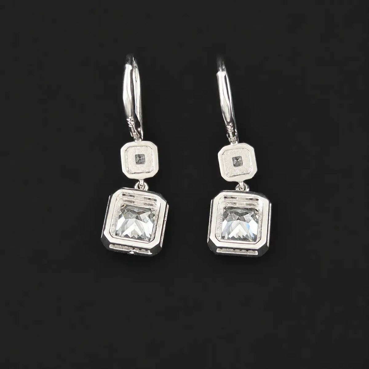 back view of luxury double halo drop earrings with pave leverbacks.