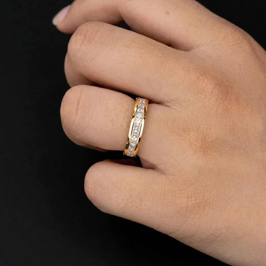 channel set princess cut eternity band worn on finger