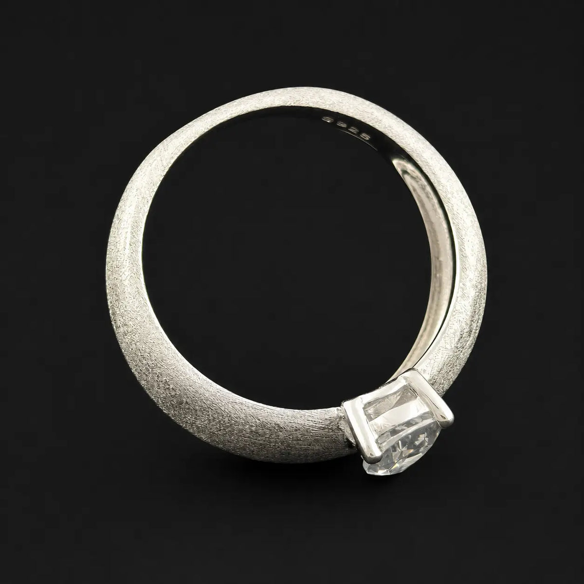 showing perfect and smooth silver ring from side view